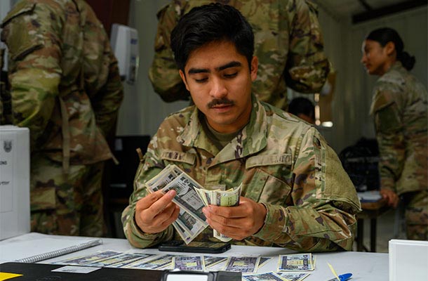 USBA supports financial planning- service member counting money