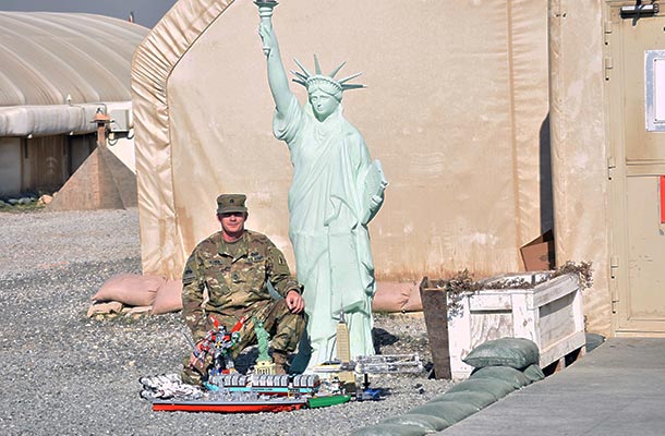 USBA encourages new hobbies- military member with Statue of Liberty replicas